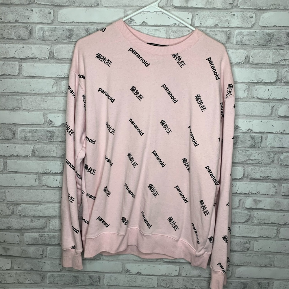 Pink paranoid sweater